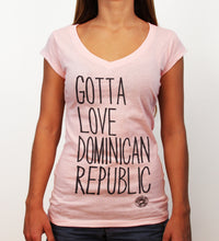 Light pink women’s v-neck t-shirt with “Gotta Love Dominican Republic” text by Hot Penguin, Ltd.