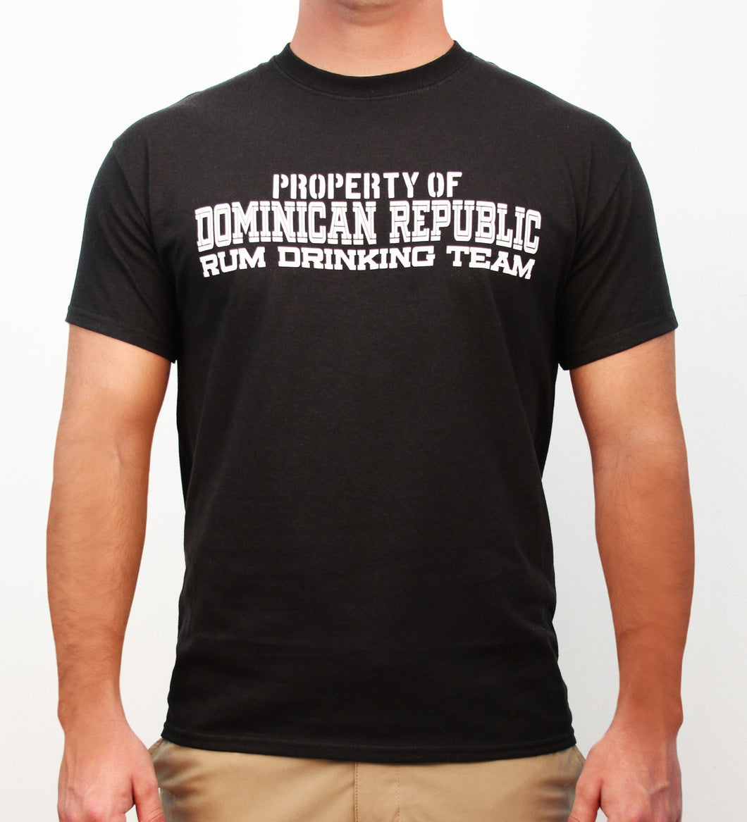 Black t-shirt with white text ‘Property of Dominican Republic Rum Drinking Team’ on a plain background by Hot Penguin, Ltd.