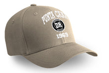 Beige adult cap with ‘Punta Cana 1969’ text and DR seal by Punta Cana T-Shirts.