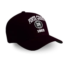 Black adult cap with ‘Punta Cana 1969’ text and DR seal by Punta Cana T-Shirts.