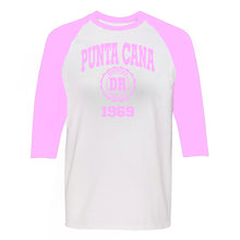 Punta Cana 1969 women's long sleeve raglan shirt in soft pink. 100% cotton long sleeve raglan shirt with Punta Cana 1969 logo printed on the front