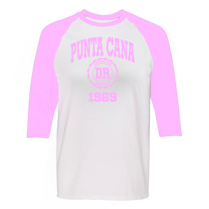 Punta Cana 1969 women's long sleeve raglan shirt in soft pink. 100% cotton long sleeve raglan shirt with Punta Cana 1969 logo printed on the front