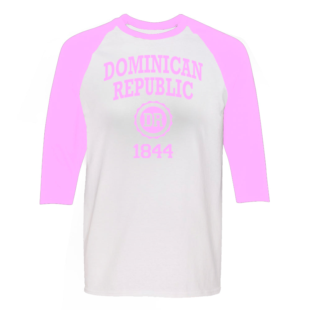Dominican Republic 1844 women's long sleeve raglan shirt in soft pink. 100% cotton long sleeve raglan shirt with Dominican Republic 1844 logo printed on the front